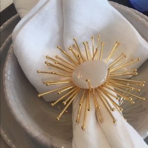 Assorted napkin rings with gold spikes